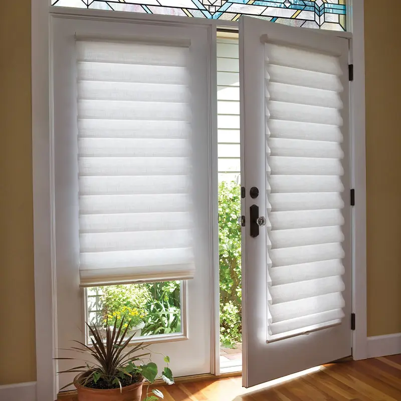 White door with adjustable roller blinds for privacy and light control.