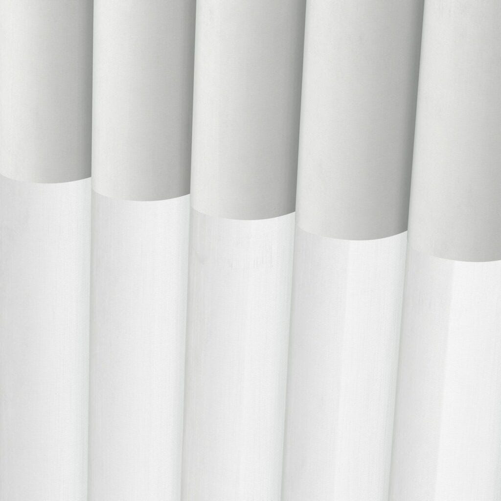White window blinds with a smooth texture, vertical orientation, and subtle shading, ideal for modern interior decor and privacy.