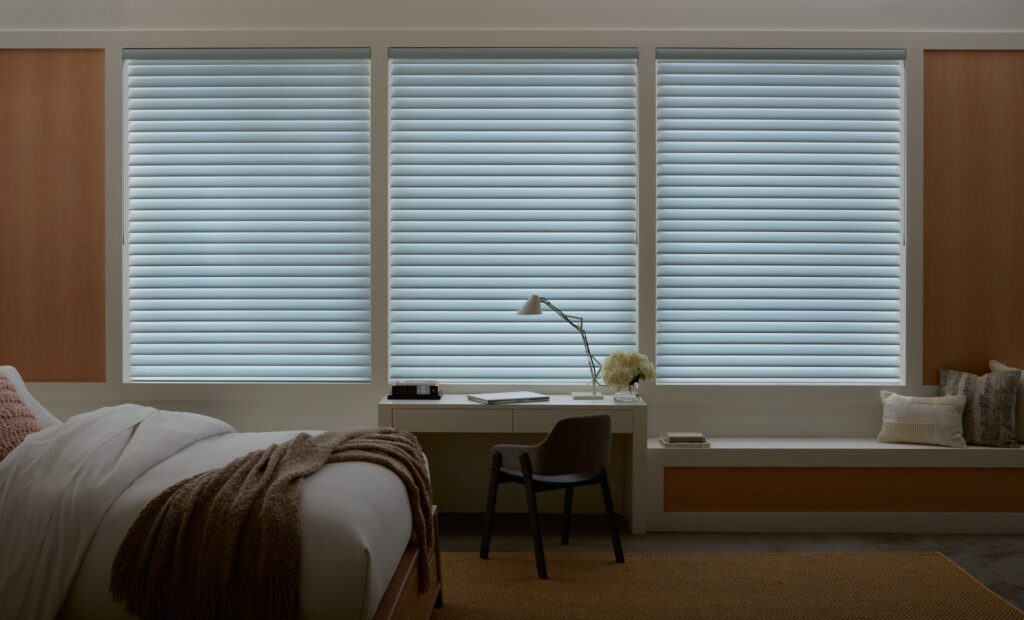 Nantucket™ Window Shadings in Misty Harbor in a bedroom