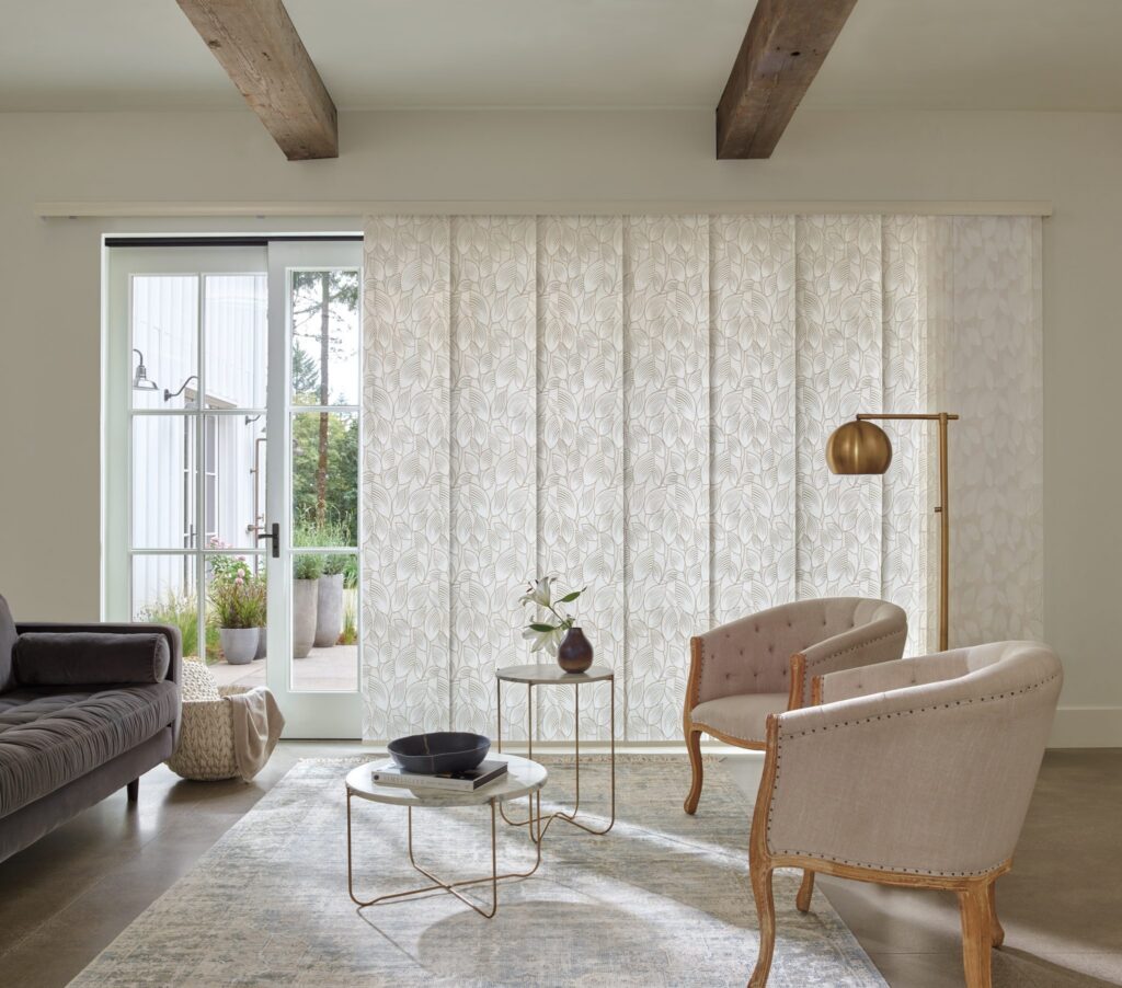 Skyline® Gliding Window Panels in Colchester with cord control in a family room